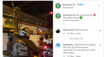 Viral Pasangan Boncengan Naik Sepeda Motor Satu Jaket Berdua, <i>So Sweet</i>! Viral Pasangan Boncengan Naik Sepeda Motor Satu Jaket Berdua, <i>So Sweet</i>!