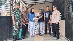 Personel Polsek dan Koramil Kawali Amankan Proses Penyaluran Bantuan Beras di Desa Citereup