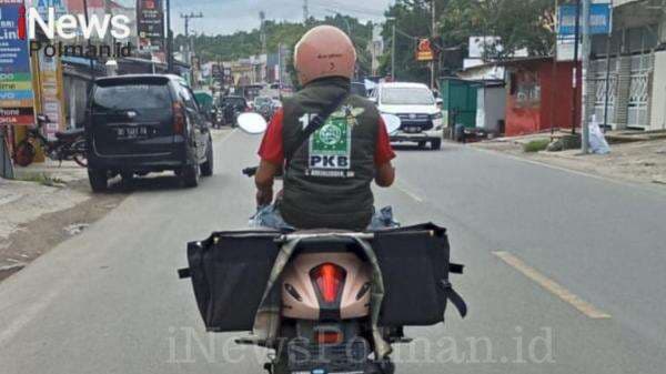 Kurir Pakai Atribut PKB Viral di Polewali Mandar, Ketua DPC Beri Apresiasi dan Tantang Sayembara Kurir Pakai Atribut PKB Viral di Polewali Mandar, Ketua DPC Beri Apresiasi dan Tantang Sayembara